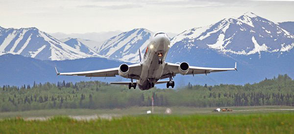 A private jet takes off from Anchorage, Alaska